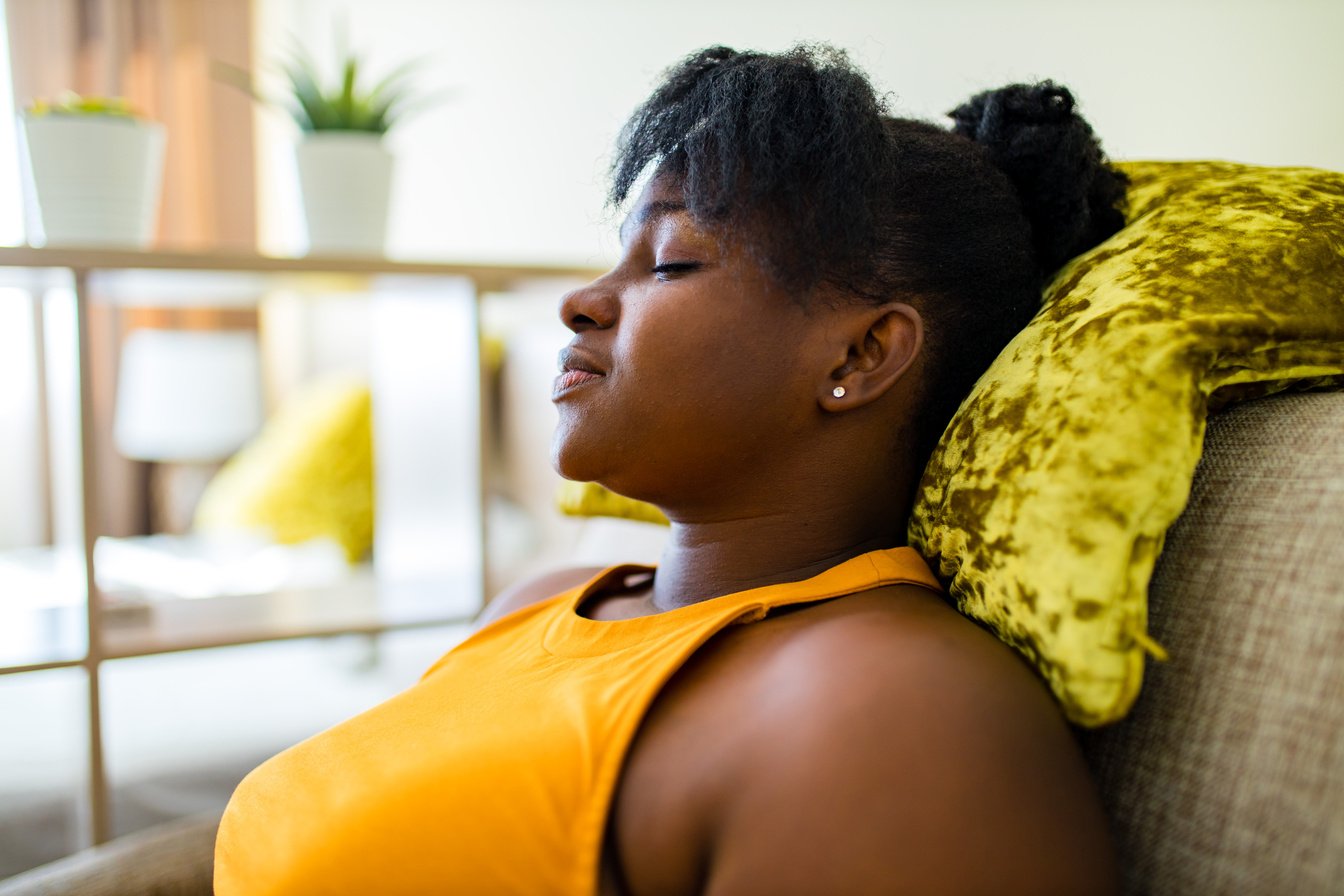 latin brazilian woman feeling calm relaxing in living room on me